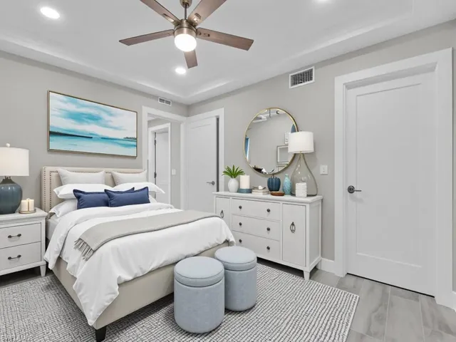 Bedroom featuring light wood-type flooring, recessed lighting, and a ceiling fan