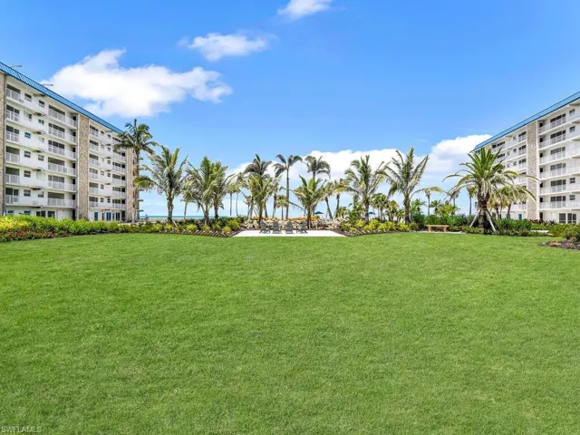 View of community with a yard