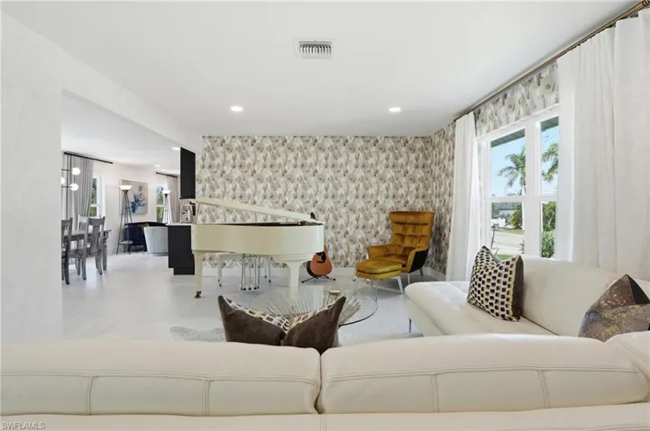 Living room featuring recessed lighting - Virtually Edited Image