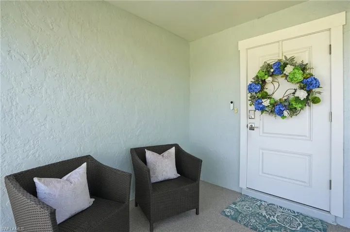Doorway to property with stucco siding - Virtually Edited Image