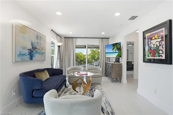 Sitting room with recessed lighting - Virtually Edited Image