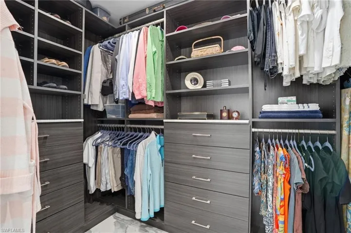 View of walk in closet - Virtually Edited Image