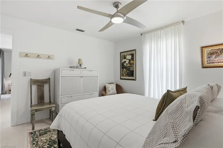 Bedroom with a ceiling fan - Virtually Edited Image