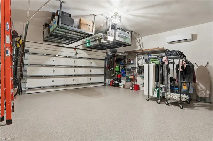 Garage with a wall mounted mini split - Virtually Edited Image