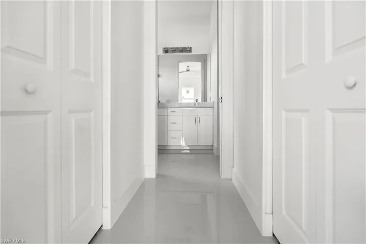 Hall featuring baseboards