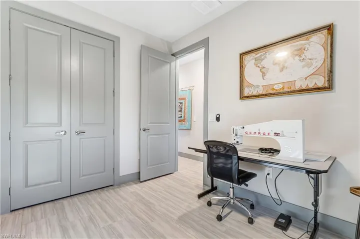 Bedroom currently being used as an office but features a French door closet