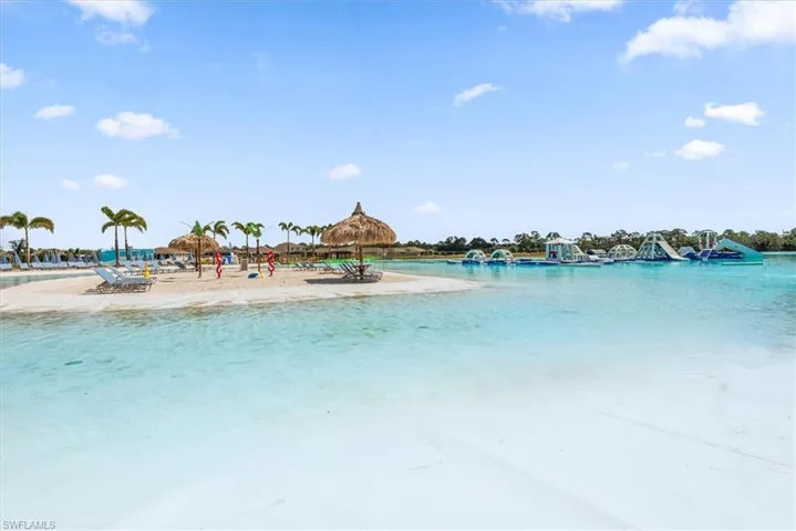 View of swimming pool with a water view