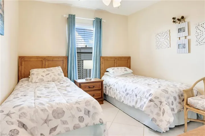 Bedroom featuring light tile patterned flooring