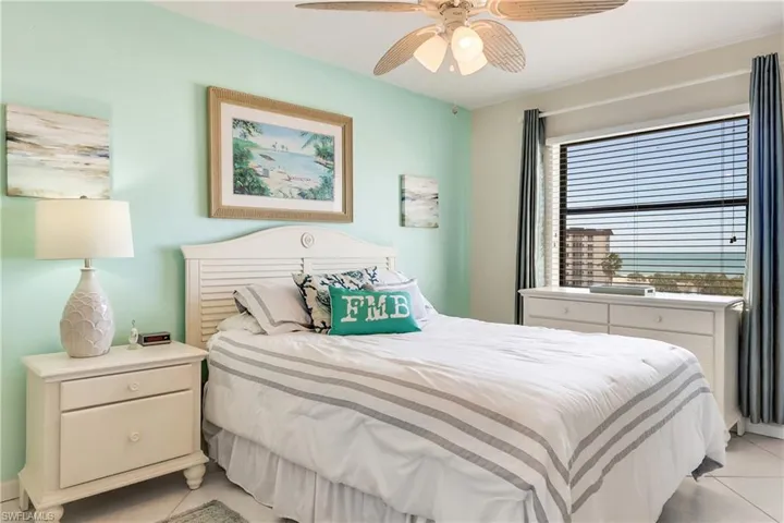 Bedroom featuring a ceiling fan and light tile patterned floors