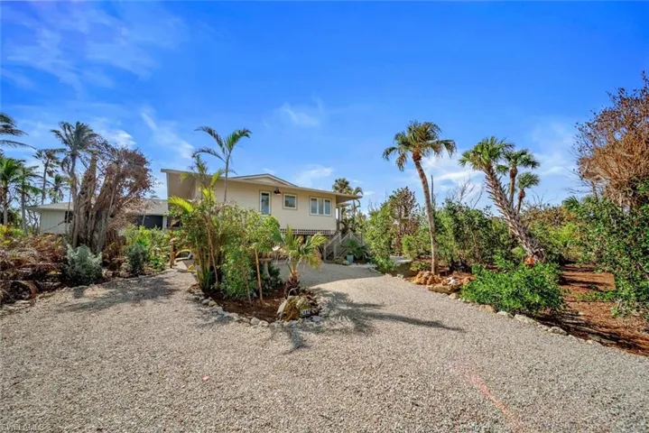 View of front of home featuring a carport