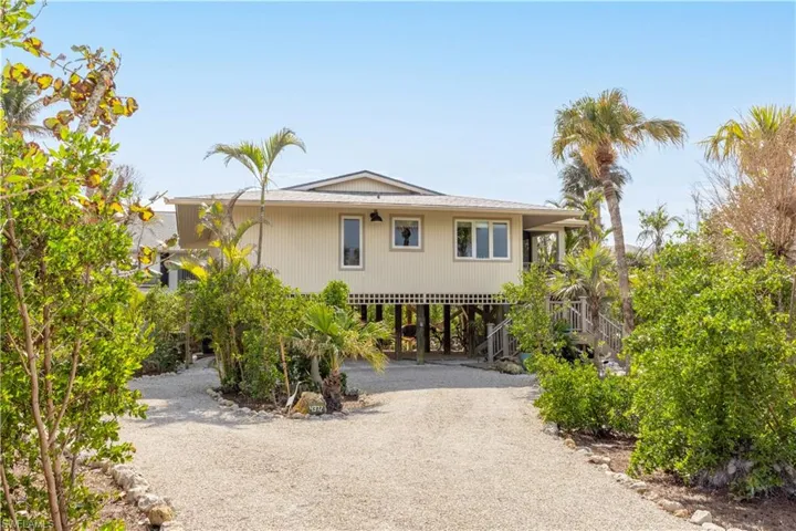 View of front of house with a carport