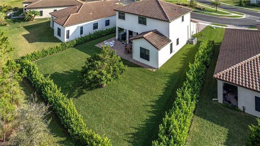 BACK OF HOME WITH LARGE YARD AND ROOM FOR POOL WITH PRIVACY