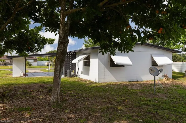 View of home's exterior featuring a yard