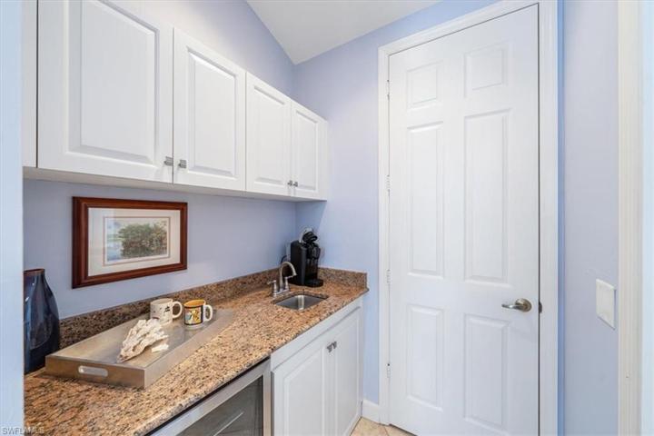Small refrigerator and coffee area for guests