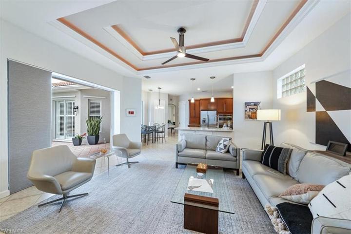 Family Room Enjoys Sliding Doors to the Courtyard/Pool
