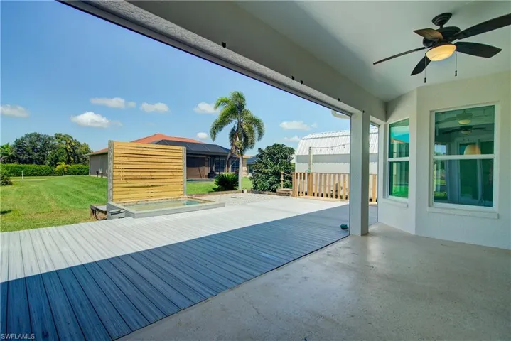 View of patio with a ceiling fan