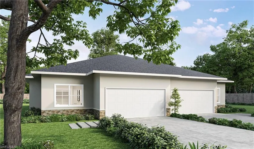 View of front of property with a front yard and a garagePicture is an artists rendering.