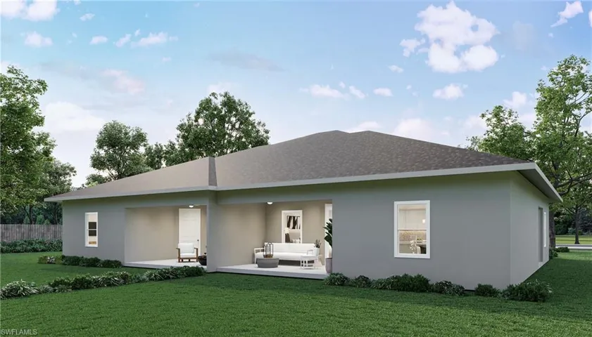Back of house featuring a patio area, an outdoor hangout area, and a lawn Picture is an artists rendering.