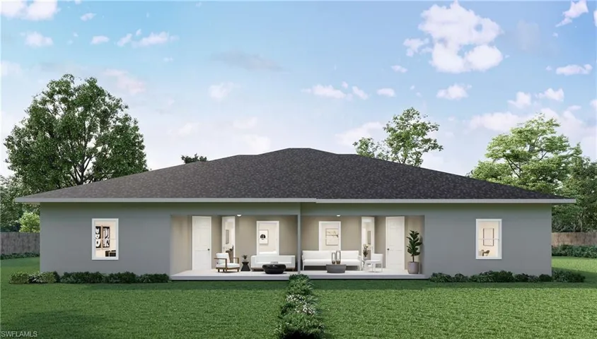 Rear view of house with a yard, a patio area, and outdoor lounge area Picture is an artists rendering.