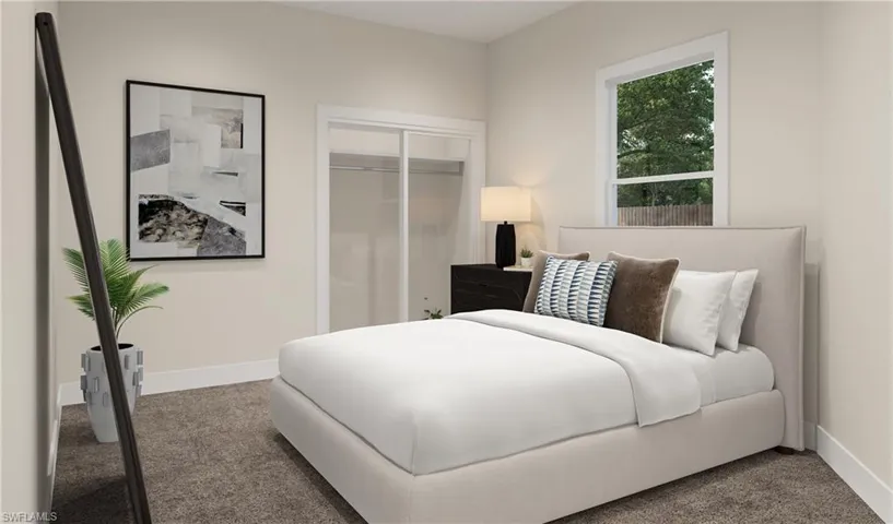 Bedroom with a closet and carpet Picture is an artists rendering.