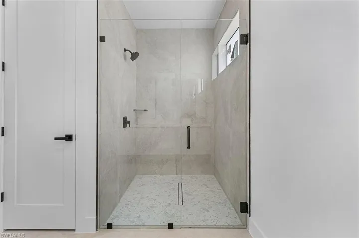 Full bathroom with a stall shower