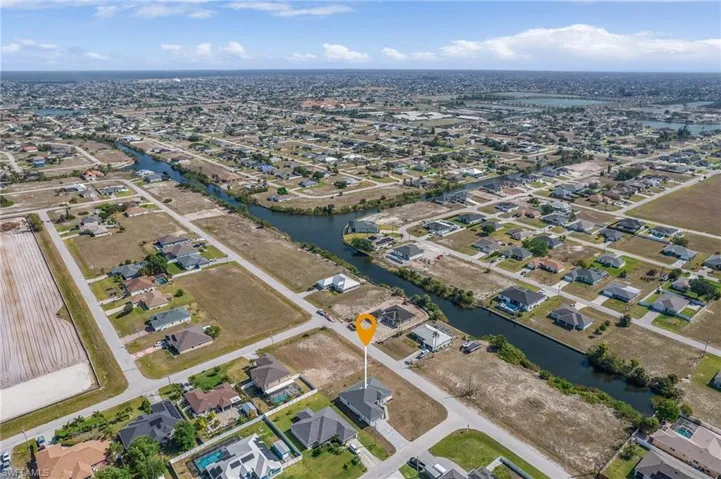 Bird's eye view with a residential view and a water view