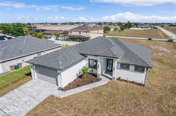 Birds eye view of property with a residential view