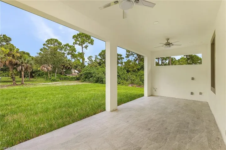 View of patio with ceiling fan