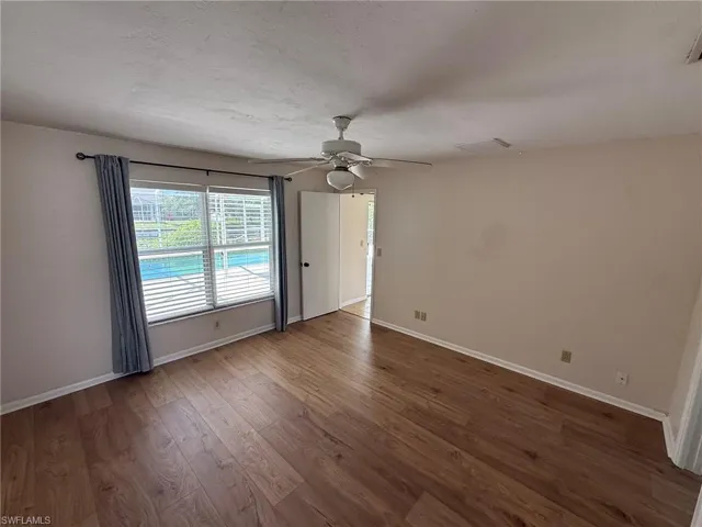 Primary Bedroom with window out to lanai
