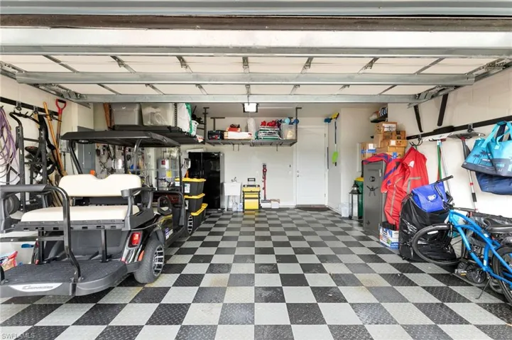 Garage with Upgraded Flooring & Stand up Safe