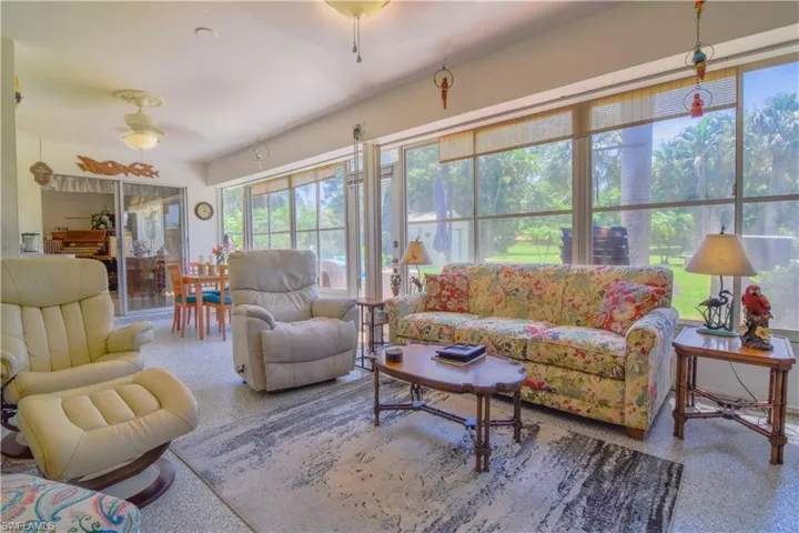 Living room featuring ceiling fan