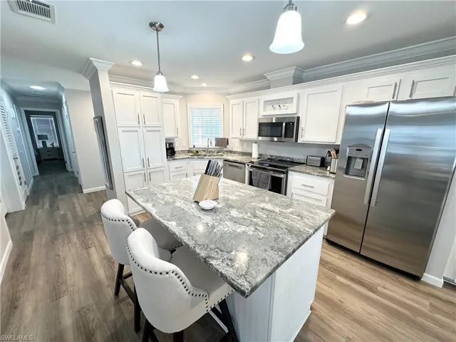 Stainless steel appliances and granite countertops