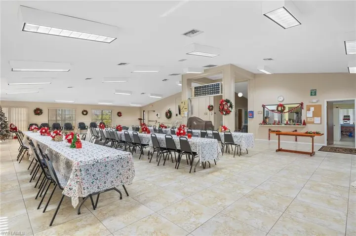 Dining room with light tile patterned floors
