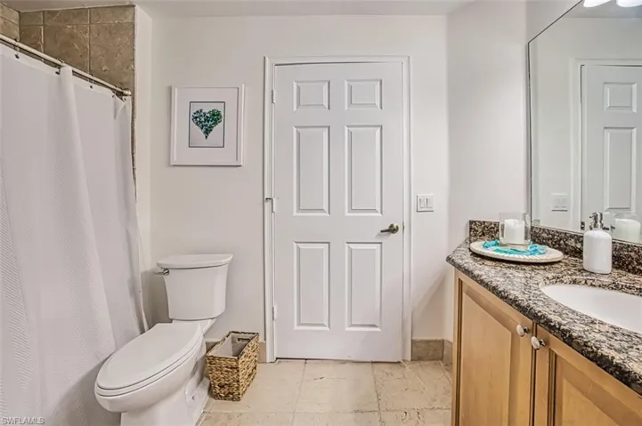 Bathroom with vanity and toilet