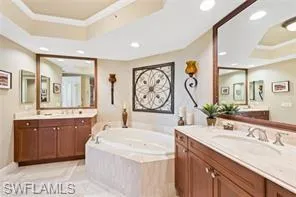 Dual sinks & jetted soaking tub.