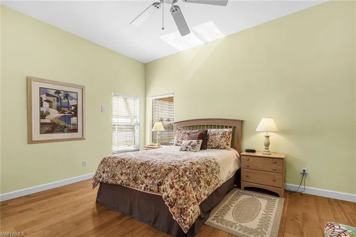 Bedroom featuring light wood-style flooring and a ceiling fan