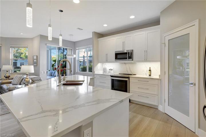 954 CARRICK BEND CIR # 102, NAPLES FL 34110