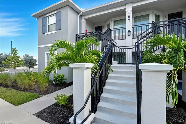 Property entrance with stucco siding