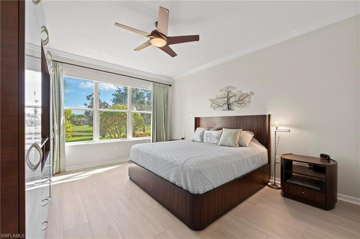 28559 Guinivere Way Bonita Springs FL 34135 -Owner's bedroom with large triple window overlooking lake