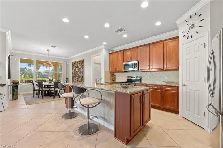 28559 Guinivere Way Bonita Springs FL 34135 - Kitchen island with tiled front