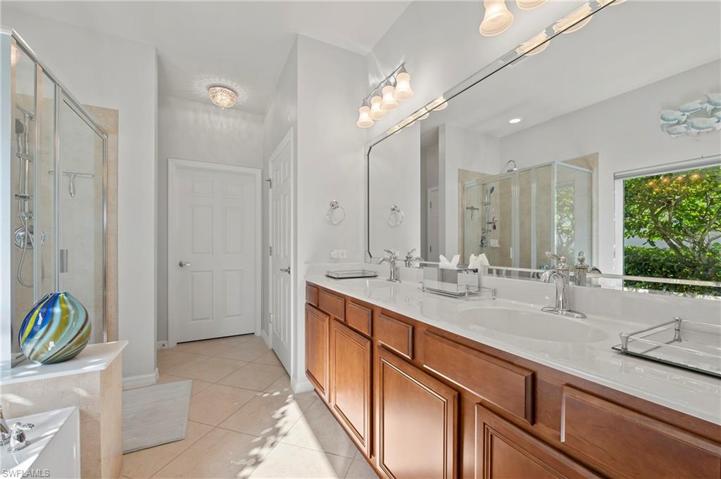 28559 Guinivere Way Bonita Springs FL 34135  - Separate tub/Shower, with dual sinks, private commode, linen closet, and large walk in closet