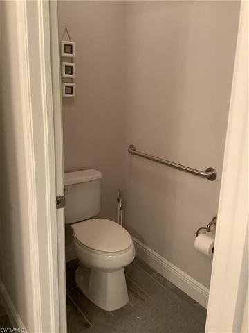 Water closet in master bathroom