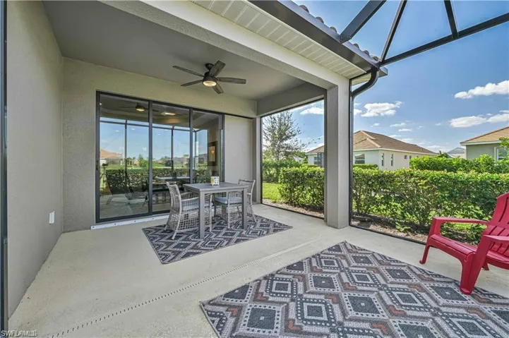Sunroom featuring ceiling fan