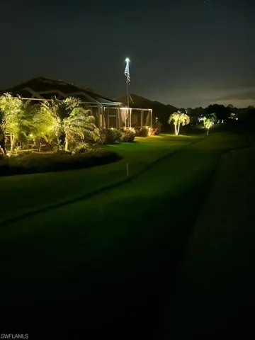 Back of Home at Night Illuminated with Uplighting