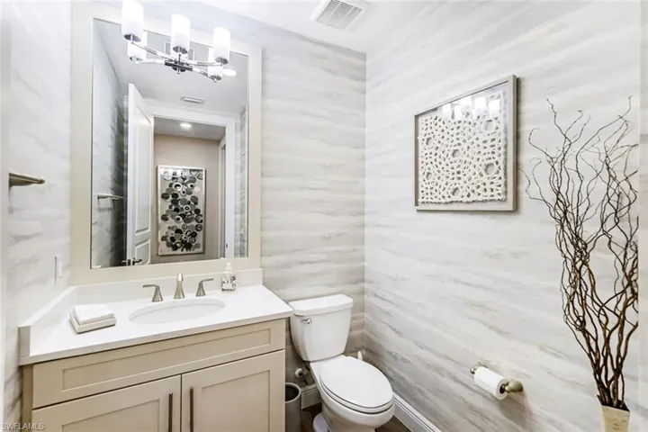 Powder bath across the hall from the den