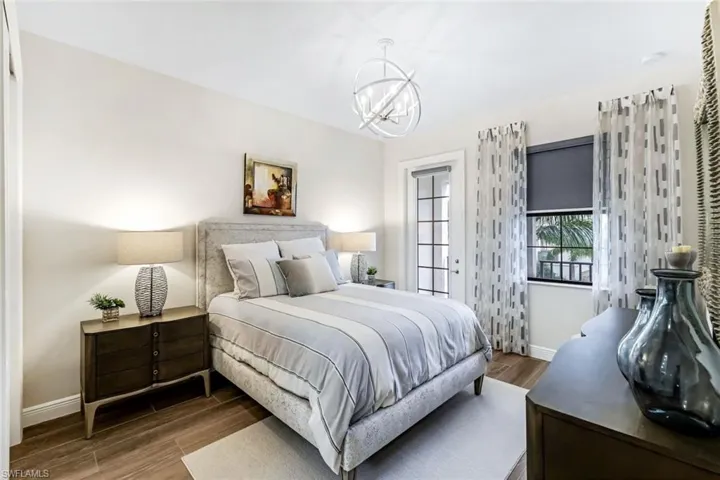 Second guest suite with tile flooring and private balcony