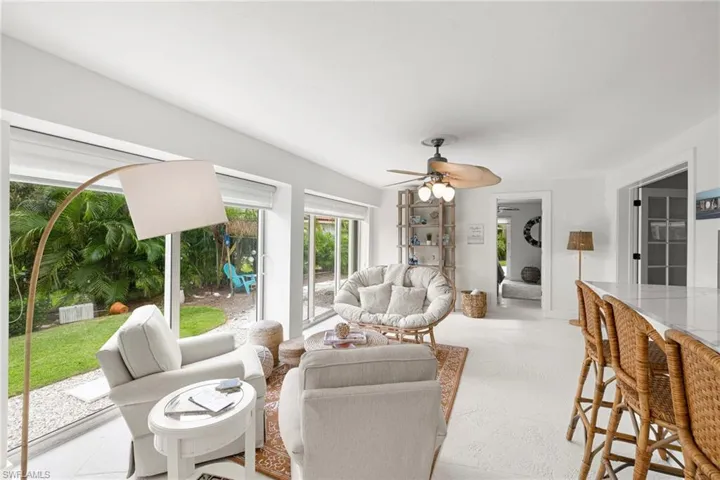 Living area with a ceiling fan