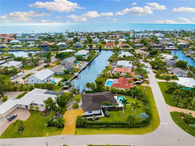 Aerial view of residential area with a large body of water