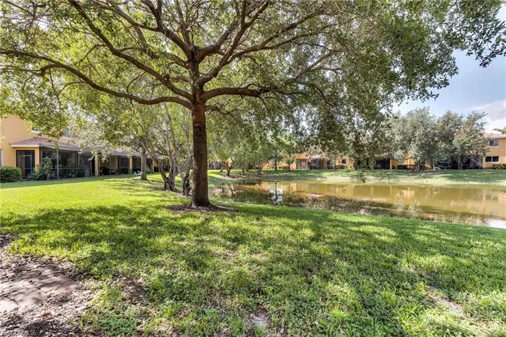 View of grassy yard featuring a water view