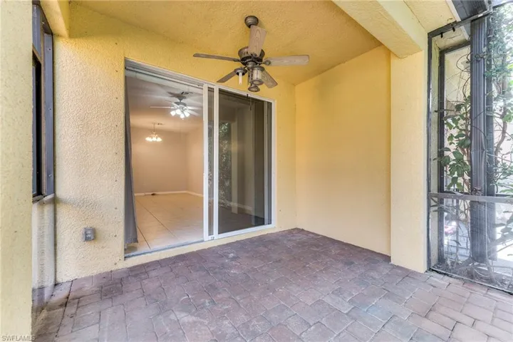 Extended screened lanai with a ceiling fan